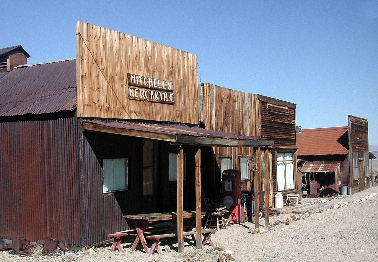 The street at Gold Point, a short row of wooden buildings in open desert.